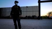 border fence and a guard