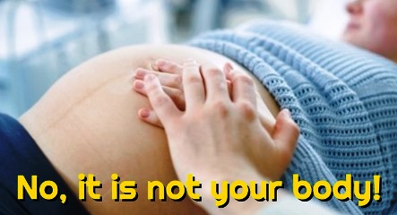 A baby is in mother's worm and written in the picture "No, it is not your baby"